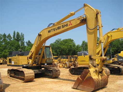 et; py. . Mitsubishi excavator history